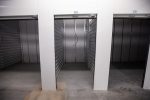 three storage units with open doors