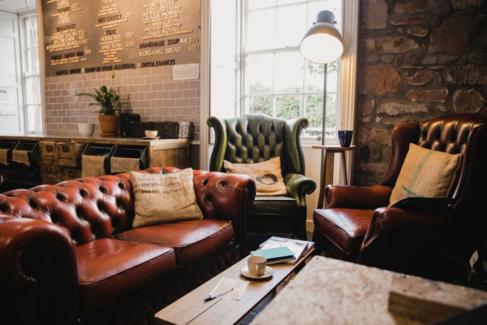 Living room with leather couch and leather arm chairs